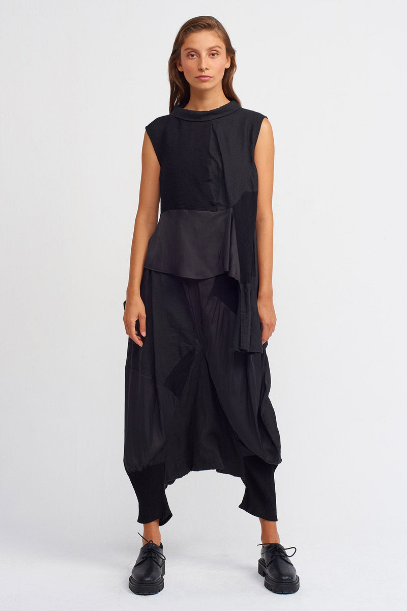 Nu Solid Sleeveless Asymmetrical Blouse Black