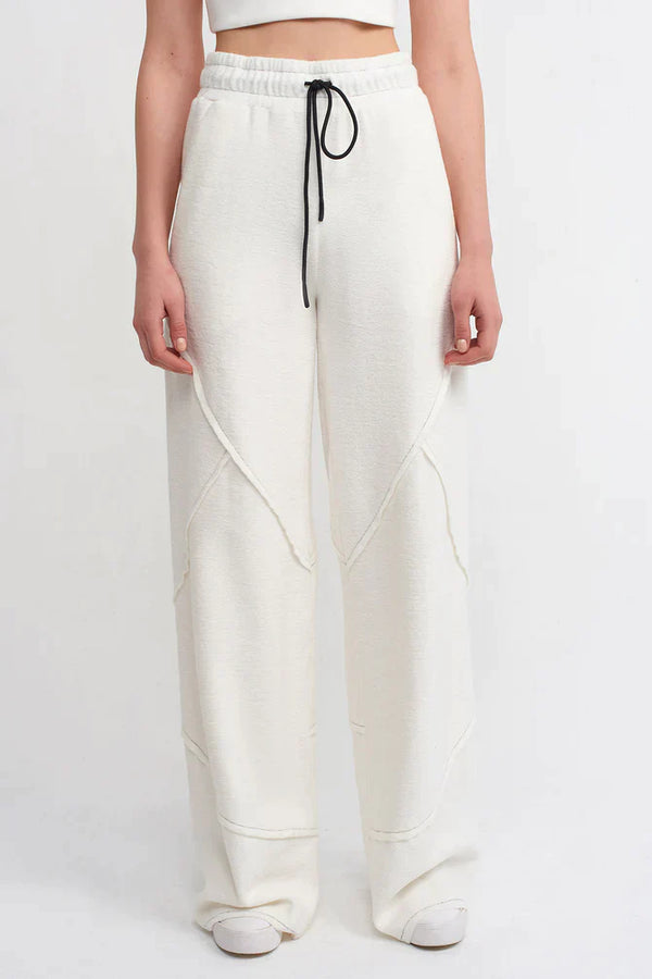 Nu Drawstring Trousers With Contrast Stitched Detail Off White